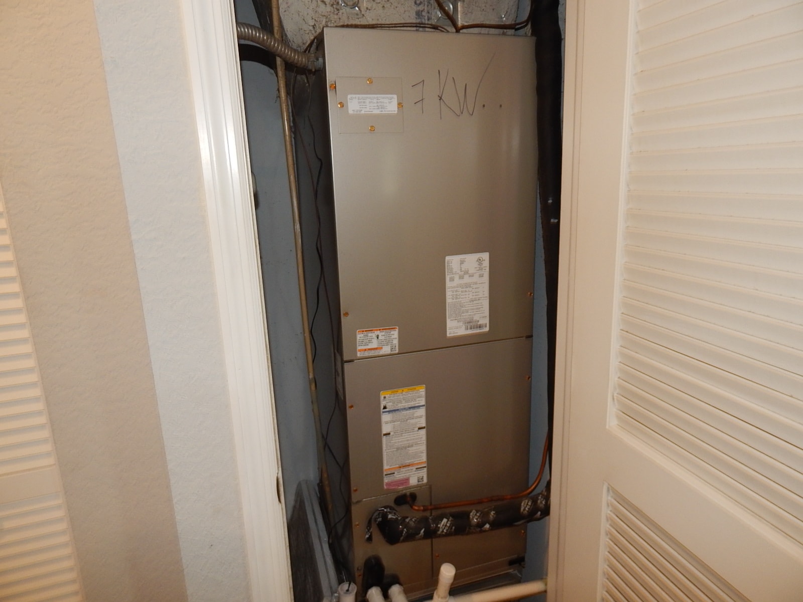 HVAC air handler unit in closet